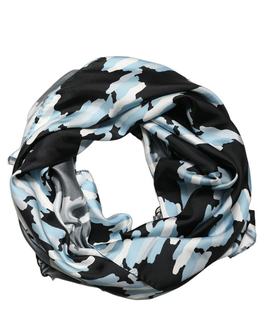 Scarf by Dolce & Gabbana for women in silk black, blue, white, patterned & camouflage features a snug silhouette, perfectly showcasing the elegant drape and premium finish of the Silk Rectangular Stole Scarf.