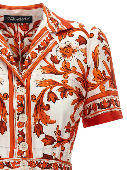 Dress by Dolce & Gabbana for women in silk twill orange & print features an eye catching silhouette with a sophisticated , elegant , and a refined midi short for a eye catching aesthetic.
