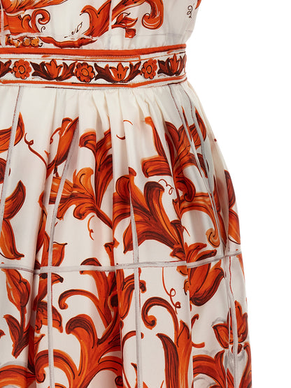 Dress by Dolce & Gabbana for women in silk twill orange & print features an sultry silhouette defined by a and , falling to an sultry midi short for a sultry look.