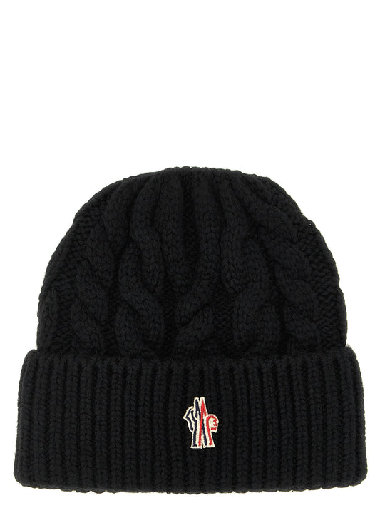Beanie Hat by Moncler Grenoble for women in polyamide & virgin wool black presents a urban-chic silhouette, showcasing the urban-chic craftsmanship of this Polyamide & Virgin Wool Beanie Hat.