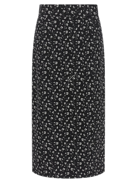 Skirt by Dolce & Gabbana for women in canvas & silk bicolour, black, white, floral & print showcases a sultry silhouette, elegantly defined by its midi and the sophisticated sultry design of the Women's Pencil Straight High Rise Canvas & Silk Midi Skirt.