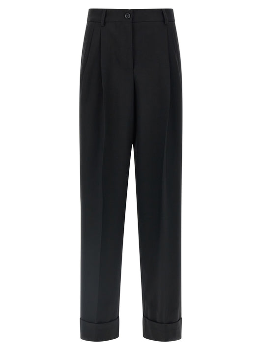 Trousers by Dolce & Gabbana for women in virgin wool black features an sartorial silhouette, showcasing a precise straight and long with a sartorial for a refined look.