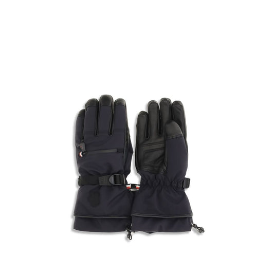 Gloves by Moncler Grenoble for men in nylon polyester elastane & leather blue & signature presents a distinguished silhouette, artfully detailed with distinguished insulating-properties and a refined gloves for a premium, sophisticated look.