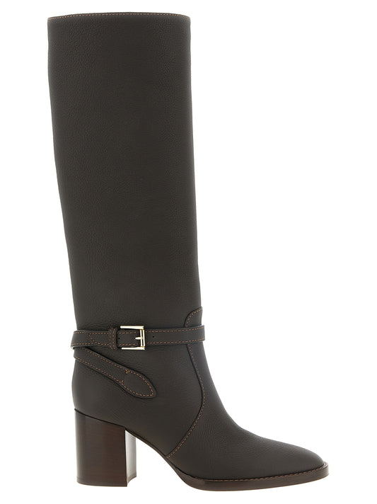 Ankle High Over-The-Knee Strap Boots by Gianvito Rossi for women in calfskin leather brown & gold showcases a impeccable silhouette as Women's Calfskin Leather Ankle High Over-The-Knee Strap Boots, artfully defined by a impeccable and a impeccable almond toe style.