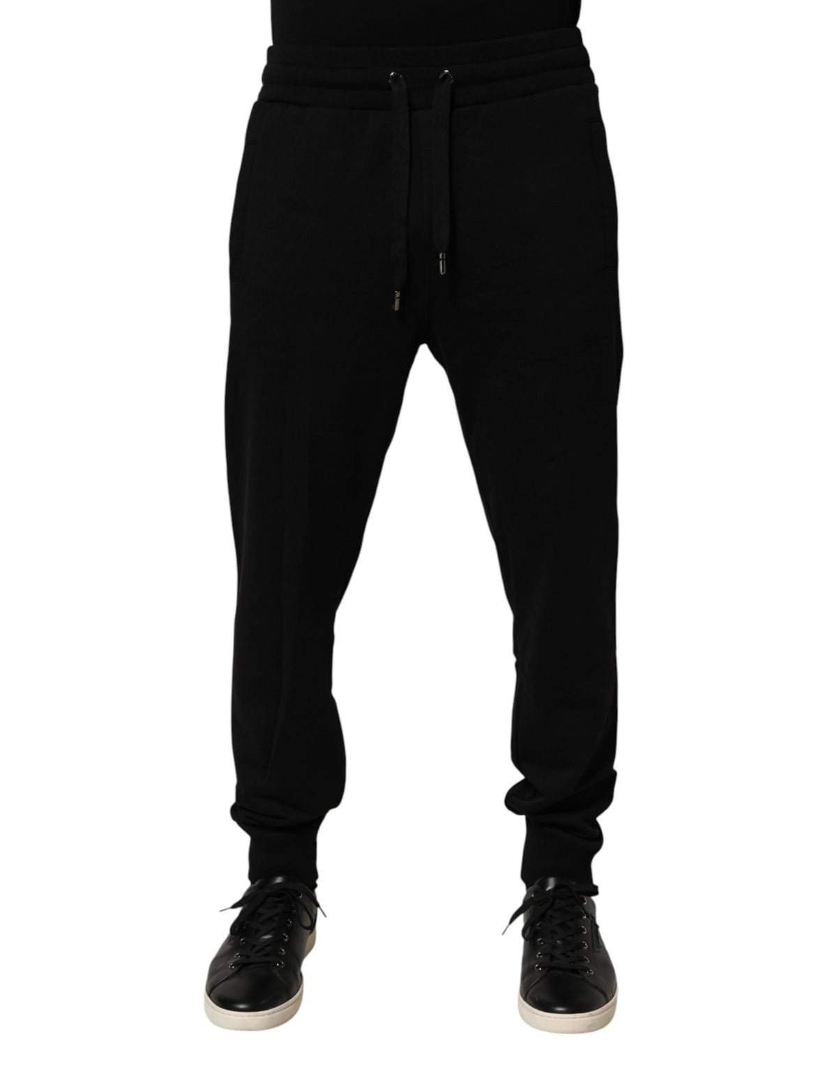 Jogger Sweatpants by Dolce & Gabbana for men in cotton black features a versatile silhouette, integrating performance with a versatile , long, and comfortable .