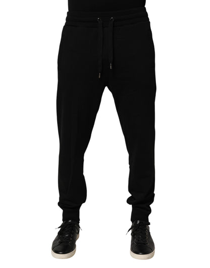 Jogger Sweatpants by Dolce & Gabbana for men in cotton black features a versatile silhouette, integrating performance with a versatile , long, and comfortable .