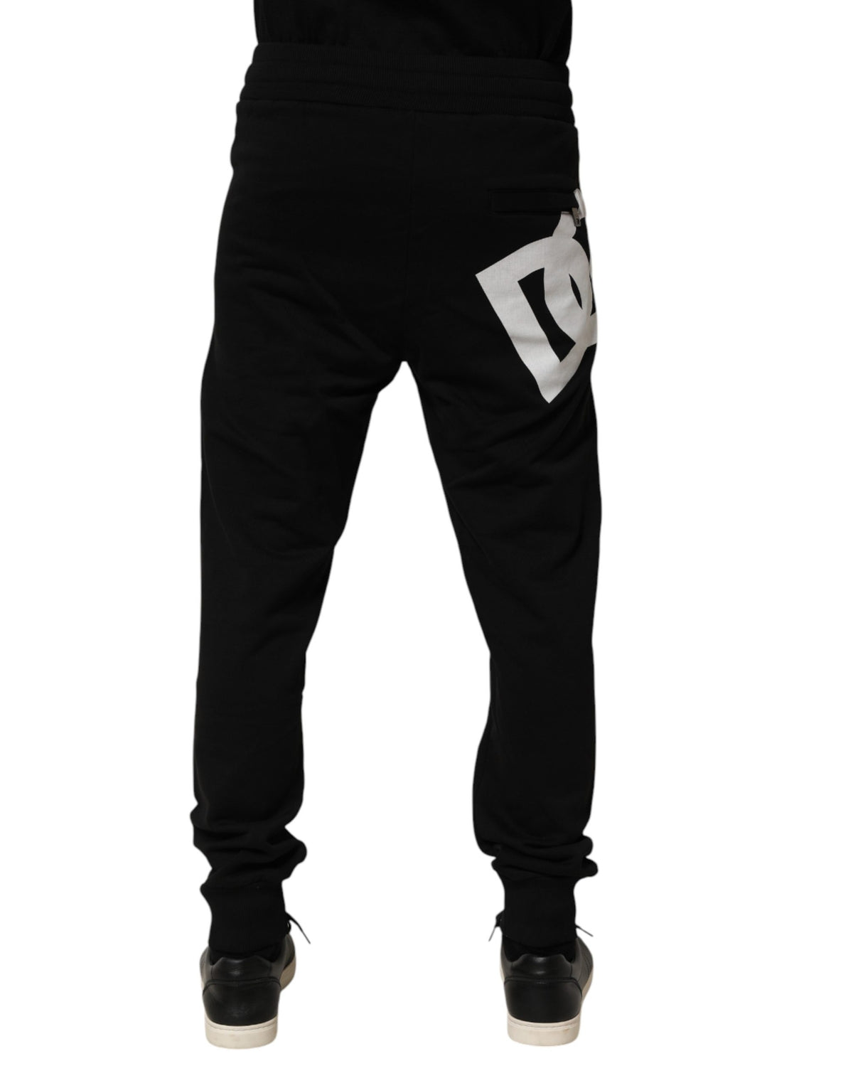 Jogger Sweatpants by Dolce & Gabbana for men in cotton black features a contemporary silhouette with , a contemporary , long hem, and for a premium, high-performance aesthetic.