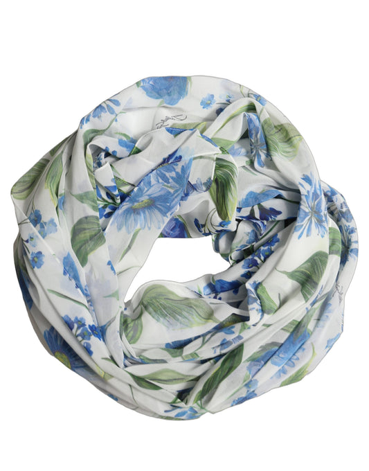Scarf by Dolce & Gabbana for women in polyester blue, white, floral & print features a timeless silhouette, artfully capturing the essence of the timeless Polyester Foulard Square Scarf design for a sophisticated look.