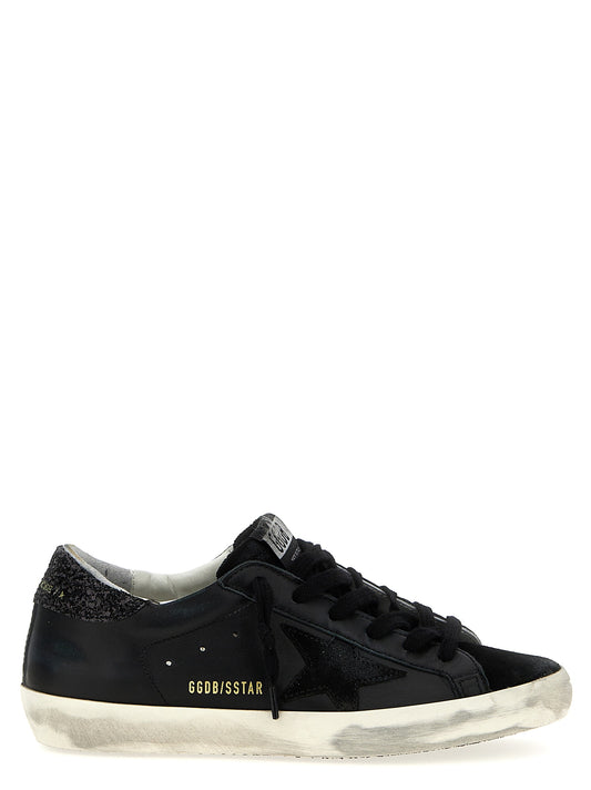 Sneakers by Golden Goose for women in polyester suede leather & cotton black presents a sumptuous silhouette, artfully capturing the essence of the Star Women's Low Top Polyester Suede Leather & Cotton Sneakers with its sumptuous low-top style design.