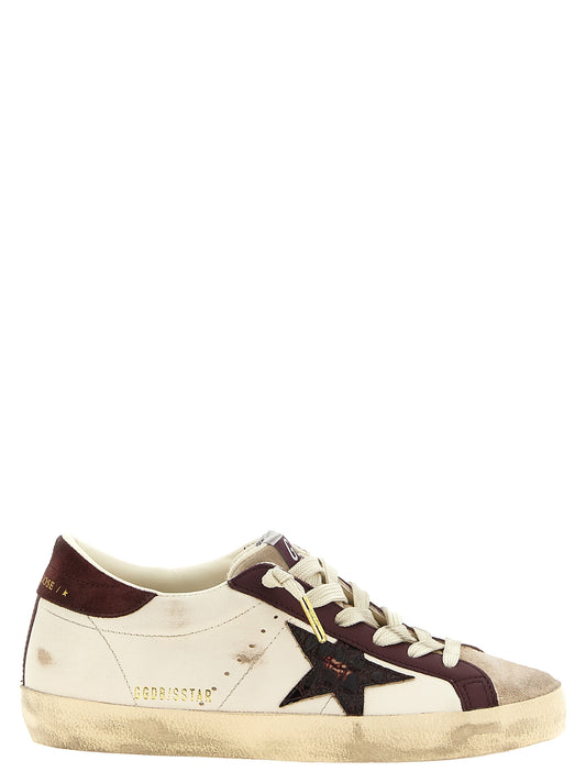 Sneakers by Golden Goose for women in croc skin leather & viscose bordeaux, burgundy, cream, gold & print presents a on trend silhouette from the Icons Star Women's Low Top Croc Skin Leather & Viscose Sneakers collection, showcasing a on trend low-top style for an elevated aesthetic.