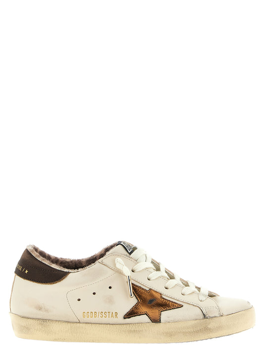 Sneakers by Golden Goose for women in suede lamb leather bronze, brown, gold, ivory, multicolor, leopard-print & print presents a impeccable silhouette as Star Women's Low Top Suede Lamb Leather Sneakers, expertly defined by a impeccable low-top style for a impeccable, high-fashion look.