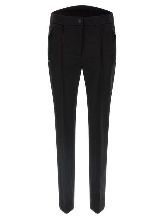 Trousers by Moncler Grenoble for women in polyamide viscose & twill black & signature features a sculptural silhouette, showcasing a sculptural athletic & slim and long with a sophisticated for a sculptural finish.