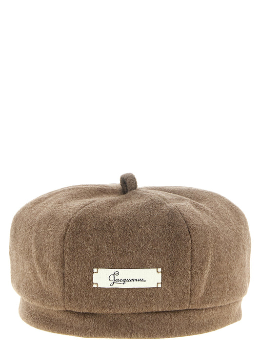 This Hat by Jacquemus for women in virgin wool brown features a exquisite silhouette, artfully capturing the sophisticated design and premium aesthetic of the Virgin Wool Hat.