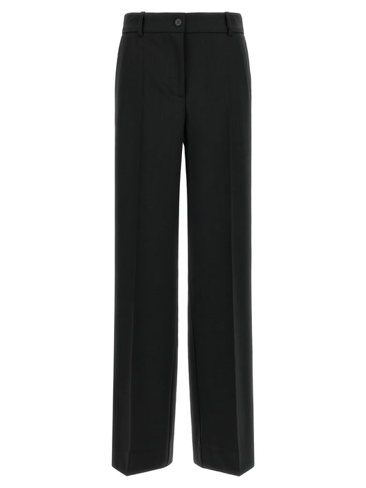 Trousers by P.A.R.O.S.H. for women in virgin wool black features an on trend silhouette, showcasing a sophisticated flared & wide with a long and for an on trend finish.