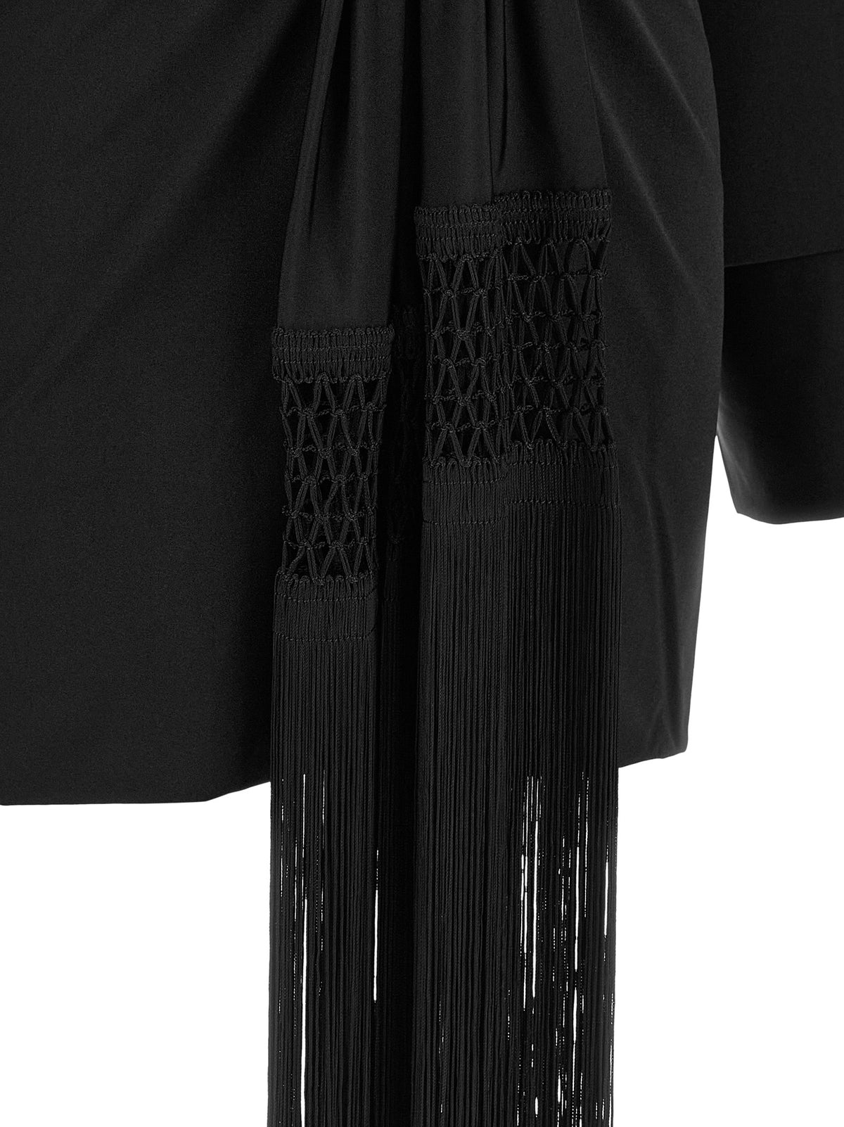 Dress by The Andamane for women in stretch polyester black features an magnificent silhouette, artfully detailed with a magnificent and that flows into an magnificent short mini.