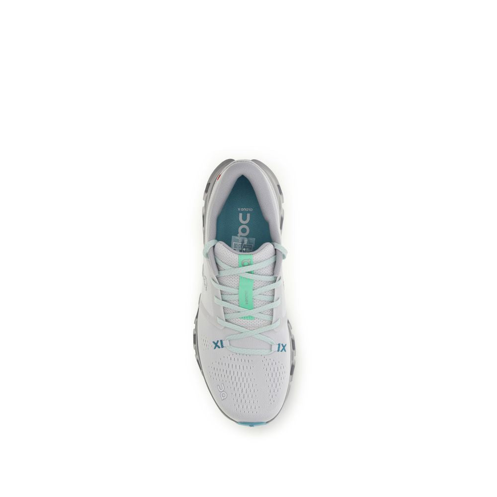 Athletic Sneakers by ON for men in mesh fabric white features an effortless chic silhouette, showcasing the signature athletic style of the Men's Athletic Mesh Fabric Sneakers collection with a truly effortless chic finish.