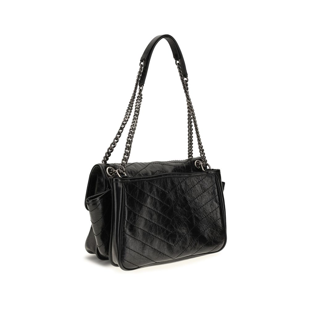 Shoulder Flap Bag by Saint Laurent for women in bos taurus calf leather black, chevron, signature & monogram features a distinguished silhouette, showcasing a secure flap & magnetic and distinguished with versatile shoulder-strap for a distinguished finish.