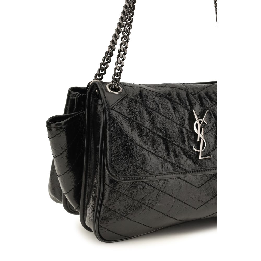 Shoulder Flap Bag by Saint Laurent for women in bos taurus calf leather black, chevron, signature & monogram features a enviable silhouette, showcasing a secure flap & magnetic, ample , and enviable shoulder-strap for a enviable finish.