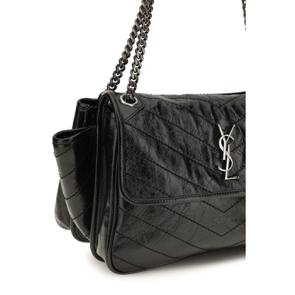 Shoulder Flap Bag by Saint Laurent for women in bos taurus calf leather black, chevron, signature & monogram features a enviable silhouette, showcasing a secure flap & magnetic, ample , and enviable shoulder-strap for a enviable finish.