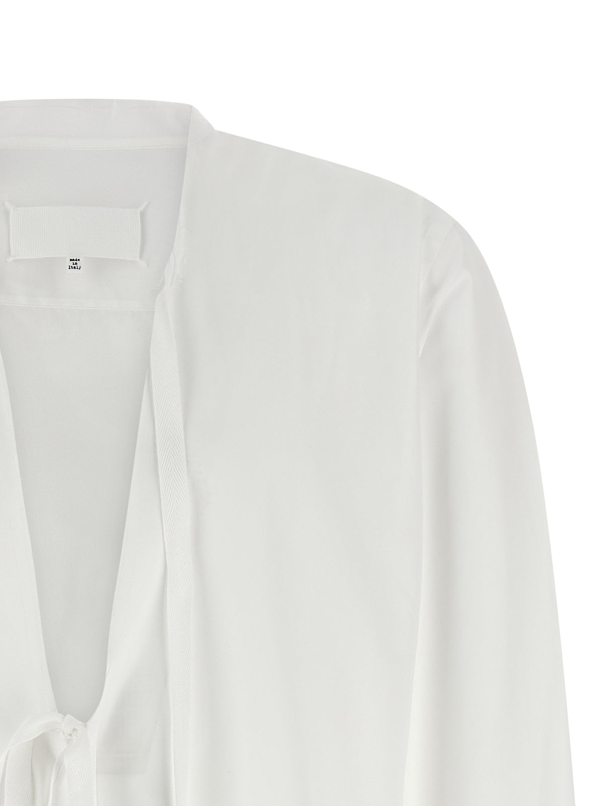 Shirt by Maison Margiela for men in cotton pearl, white & signature features an polished silhouette, showcasing a sophisticated v-neck neckline and detail for a truly polished finish.