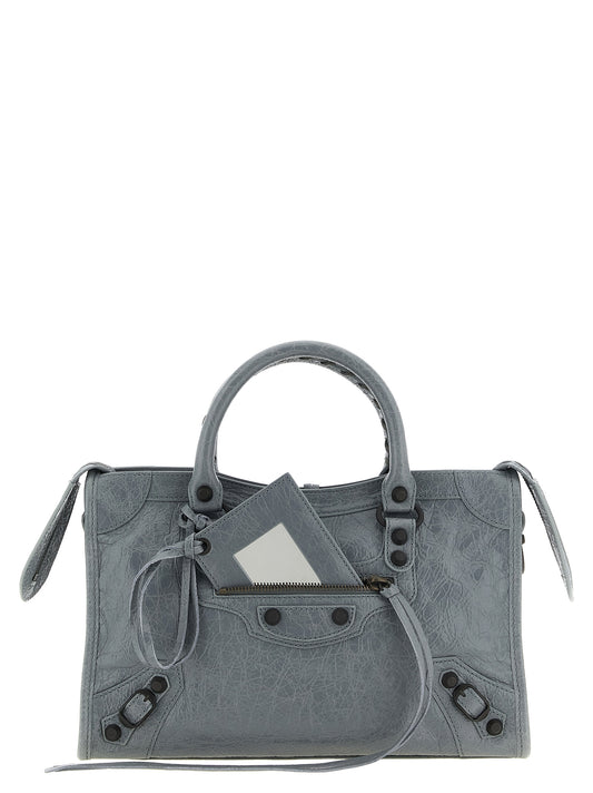 Handbag by Balenciaga for women in lambskin leather gray features a exquisite silhouette, showcasing a secure and exquisite with versatile shoulder-strap & handle for a exquisite finish.