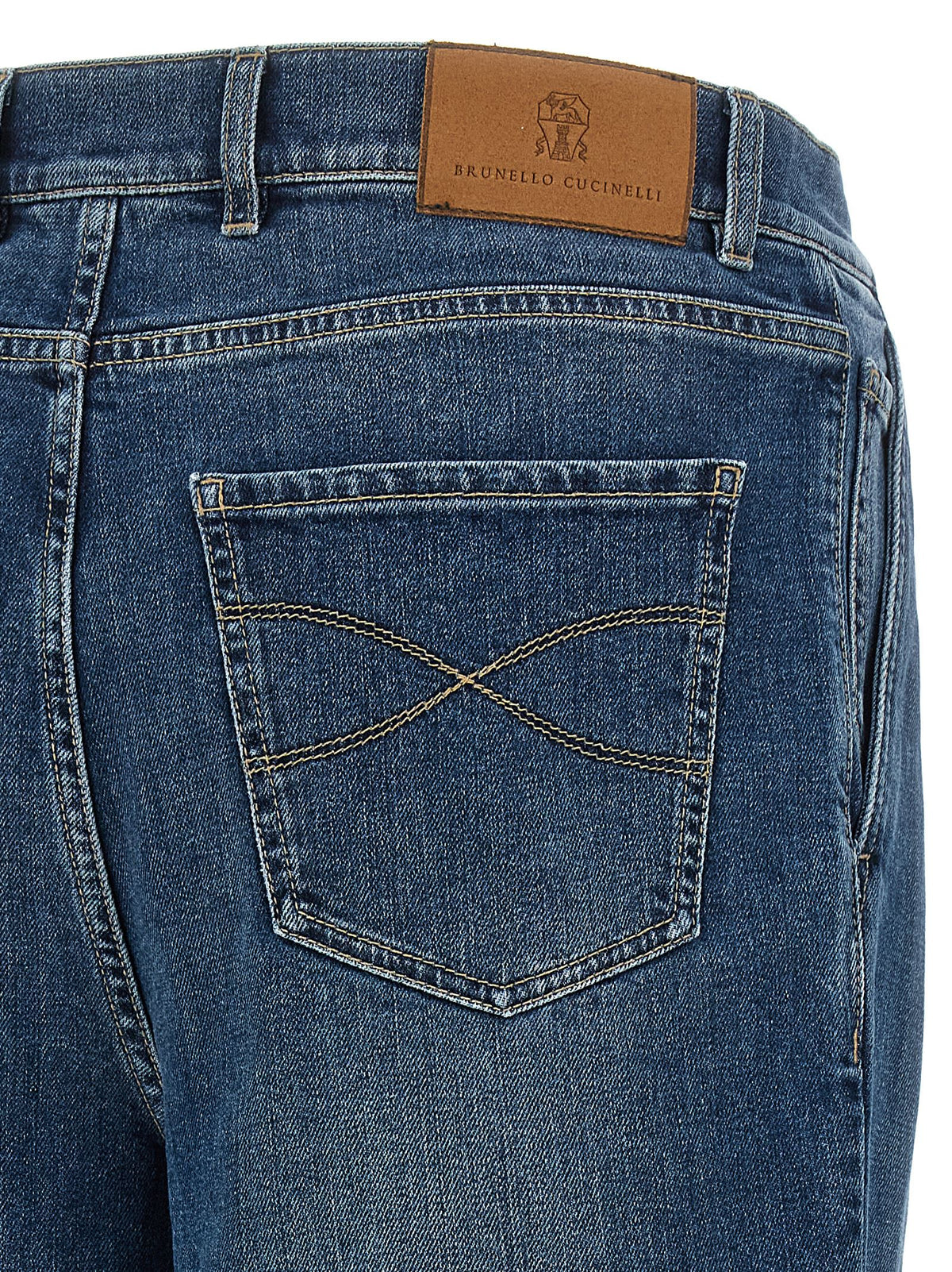 Jeans by Brunello Cucinelli for men in stretch denim cotton blue & signature presents a refined pantology silhouette, artfully defined by a refined pantology , long, and a sophisticated .