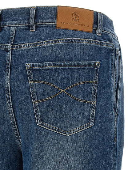 Jeans by Brunello Cucinelli for men in stretch denim cotton blue & signature presents a refined pantology silhouette, artfully defined by a refined pantology , long, and a sophisticated .