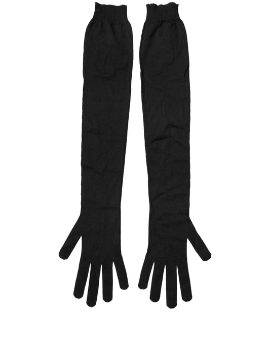 Gloves by Dolce & Gabbana for men in polyester black presents a distinguished silhouette, artfully detailed with distinguished and a refined elbow-length-gloves for a premium, sophisticated look.