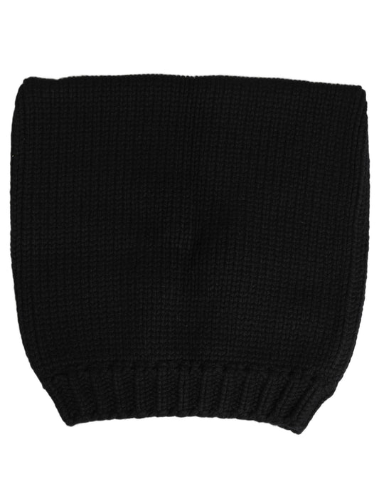 Beanie Hat by Dolce & Gabbana for men in cashmere black presents a sleek silhouette, showcasing the sleek texture and refined craftsmanship of the Cashmere Beanie Hat collection.