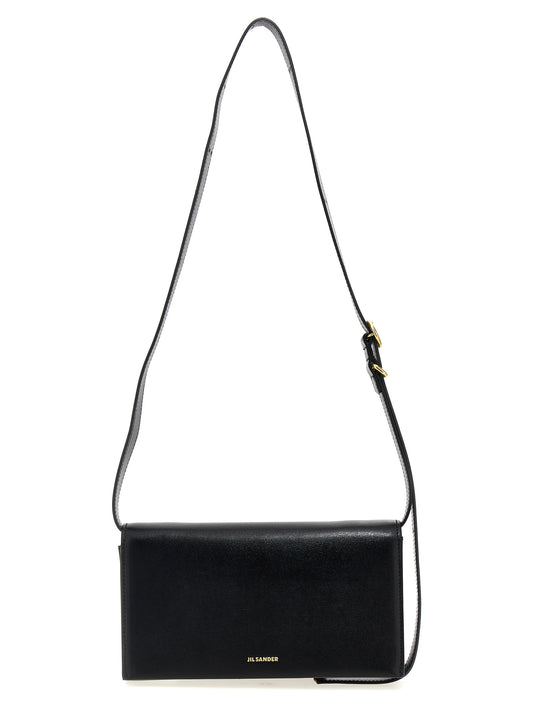 Crossbody Handbag by Jil Sander for women in leather black features a versatile chic silhouette, meticulously detailed with a secure snap & button, ample , and versatile crossbody-strap, shoulder-strap & adjustable-strap.