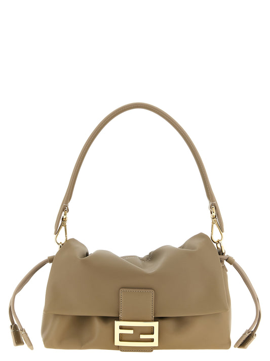 Shoulder Drawstring Baguette Handbag by Fendi for women in nappa lamb leather beige & gold features a contemporary silhouette, showcasing a secure flap & buckle, ample , and contemporary shoulder-strap & handle for a sophisticated look.