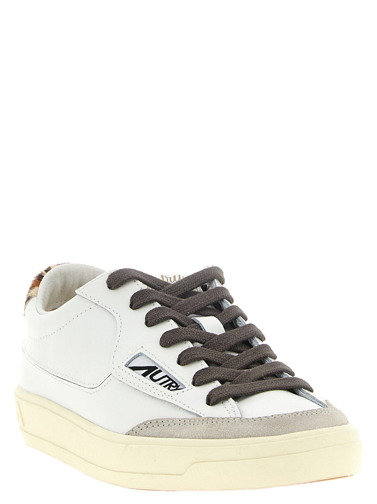 Sneakers by Autry for women in cowhide suede leather animal, cream, gray, multicolor, white & print presents a on trend silhouette from the Pony Women's Low Top Cowhide Suede Leather Sneakers collection, showcasing a on trend low-top style for an elevated aesthetic.