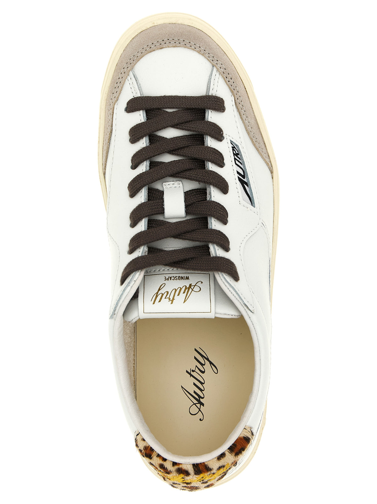 Sneakers by Autry for women in cowhide suede leather animal, cream, gray, multicolor, white & print features an fashionable silhouette, showcasing the premium Pony Women's Low Top Cowhide Suede Leather Sneakers in a fashionable low-top style that offers a fashionable finish for refined style.