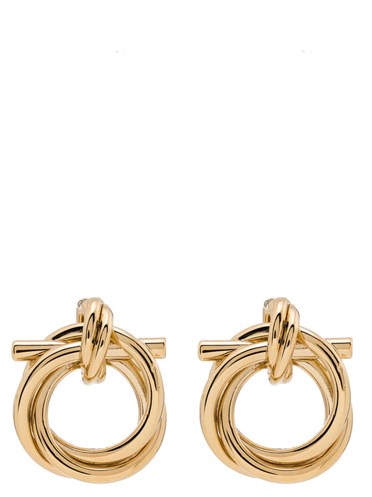 Earrings by Ferragamo for women in gold showcases a artisanal silhouette, artfully capturing the essence of Gancini Women's Gold Brass Earrings with its exquisite .