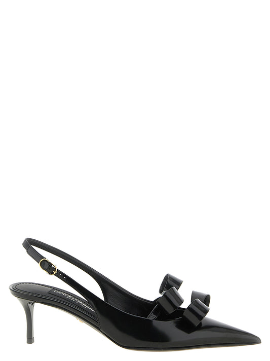 Mid-Heel Slingback Pumps Heels by Dolce & Gabbana for women in calfskin leather and black & gold showcases a effortlessly elegant silhouette as Women's Calfskin Leather Mid-Heel Slingback Pumps Heels, featuring a effortlessly elegant mid-heel and a effortlessly elegant pointed toe style for an elegant look.