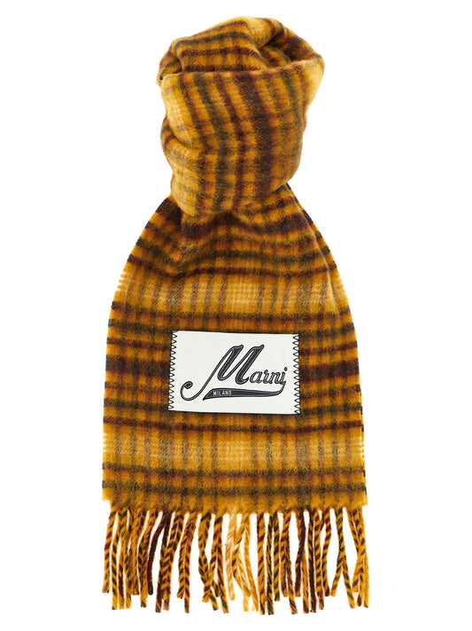 Scarf by Marni for women in mohair alpaca polyamide & virgin wool brown, multicolor, mustard, yellow & checked presents a effortlessly chic silhouette, artfully capturing the essence of the effortlessly chic Mohair Alpaca Polyamide & Virgin Wool Foulard Wrap Fringes Scarf design for a sophisticated look.