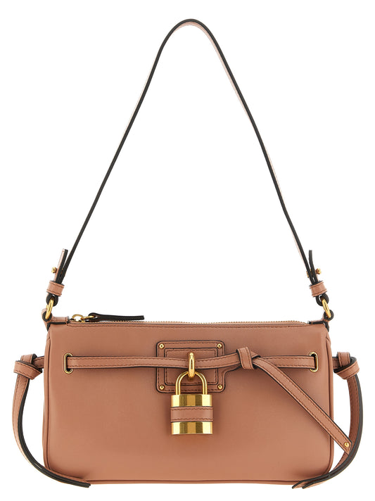 Mini Shopper Tote Clutch Handbag by Chloé for women in lamb leather gold, multicolor & pink showcases a sculptural silhouette, featuring a secure zipper, ample , and versatile for a sculptural aesthetic.