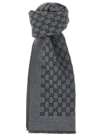 Scarf by Gucci for men in wool gray showcases a eye catching silhouette, artfully capturing the essence of the eye catching Wool Scarf design for a sophisticated look.