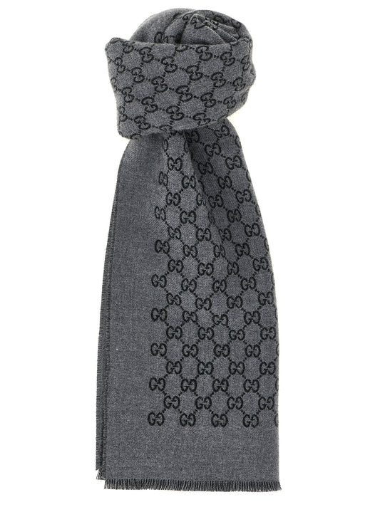Scarf by Gucci for men in wool gray showcases a eye catching silhouette, artfully capturing the essence of the eye catching Wool Scarf design for a sophisticated look.