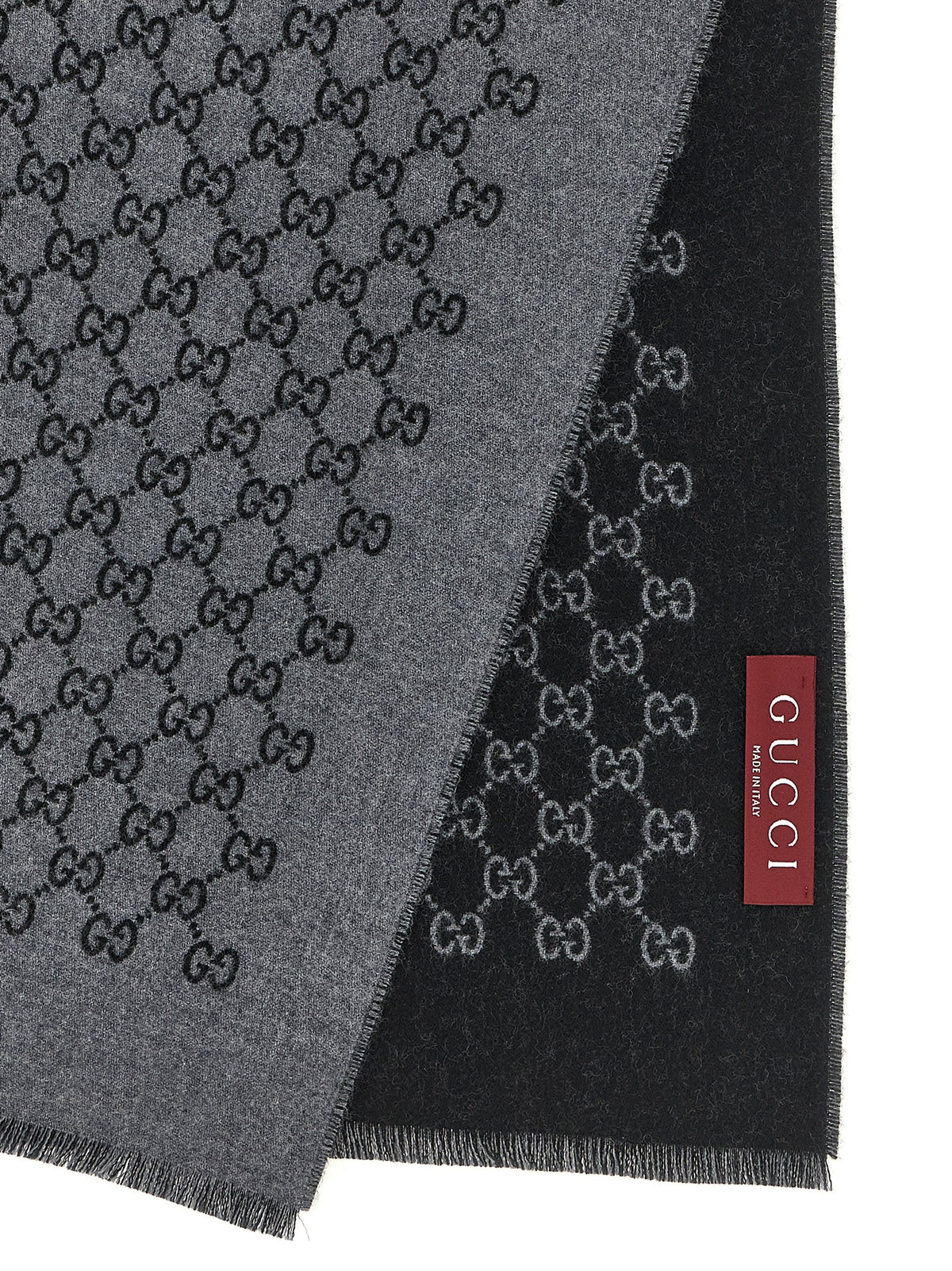 Scarf by Gucci for men in gray showcases a on trend silhouette, artfully capturing the on trend essence of the Wool Scarf design with a sophisticated finish.