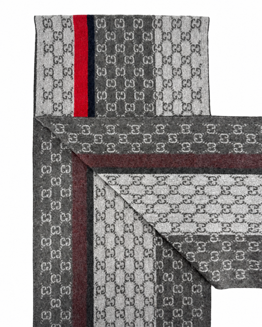 Scarf by Gucci for unisex in cashmere black, charcoal, gray, red, patterned, signature, monogram & striped features a snug silhouette, perfectly showcasing the elegant drape and premium finish of the Gg Cashmere Fringes Scarf.
