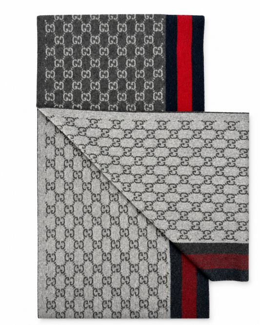 Scarf by Gucci for unisex in cashmere charcoal, gray, navy, red, patterned, signature, monogram & striped showcases a warm silhouette from the Gg Cashmere Fringes Scarf collection, offering a warm drape that exudes sophisticated luxury.