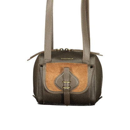 Handbag by Coccinelle for women in polyolefin leather brown features an refined silhouette, showcasing a secure zipper & magnetic, ample external-pockets & internal-pockets, and versatile handle for a sophisticated refined aesthetic.