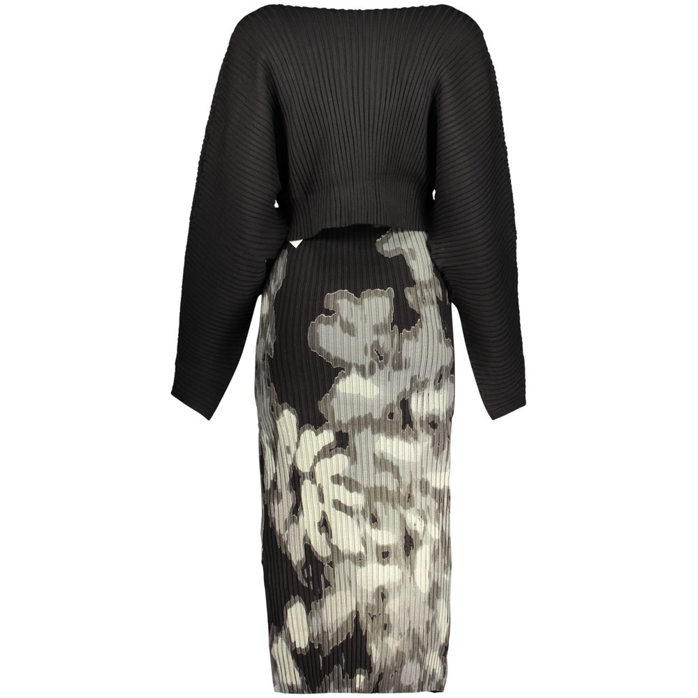 Dress by Desigual for women in polyester & viscose black, patterned & print features an cute silhouette, detailed with a and that elegantly flows into a cute long.