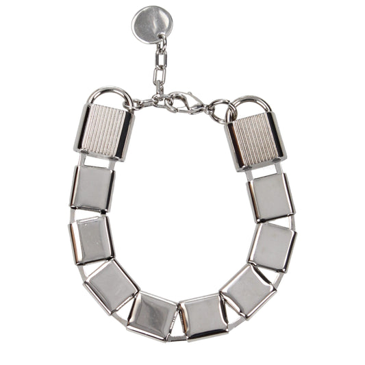 Bracelet by Tom Ford for women in suede leather gray & silver showcases a luminous , artfully capturing the essence of the luminous Women's Silver Bracelet collection.