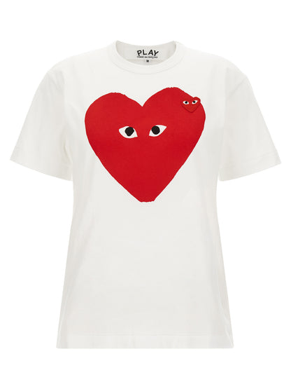 T-Shirt by Comme Des Garçons Play for women in cotton red, white & print showcases a unassuming silhouette, artfully detailed with a refined crew neckline and unassuming for a sophisticated, contemporary look.