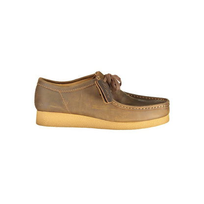 Loafer Slip-On Lace-Up Shoes by Clarks for men in polyester polyurethane leather brown showcases a timeless silhouette from the Men's Polyester Polyurethane Leather Loafer Slip-On Lace-Up Shoes collection, featuring a timeless and for a timeless finish.