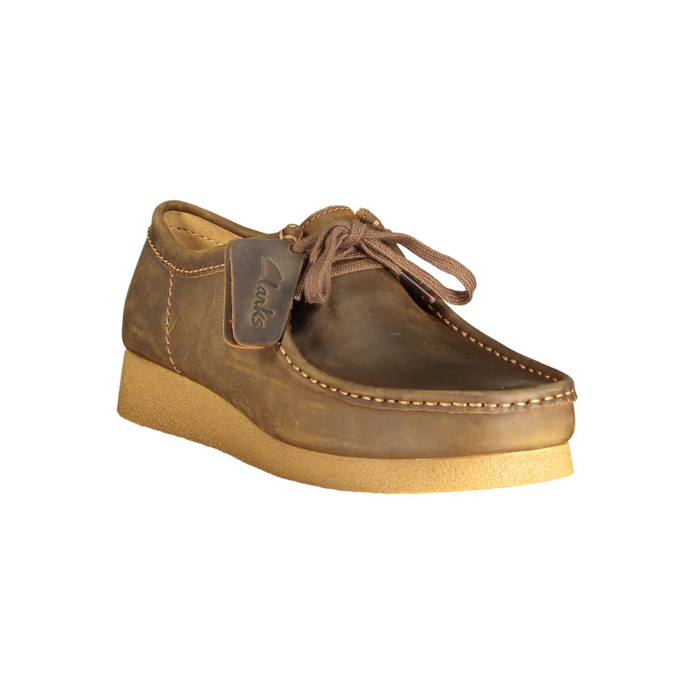 Loafer Slip-On Lace-Up Shoes by Clarks for men in polyester polyurethane leather brown features an dynamic silhouette from the Men's Polyester Polyurethane Leather Loafer Slip-On Lace-Up Shoes collection, defined by a dynamic and for a dynamic look.