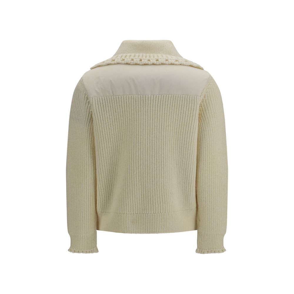 Cardigan by Moncler Grenoble for women in nylon polyamide polyester & wool beige showcases a captivating silhouette, artfully detailed with a captivating and for a truly sophisticated captivating look.