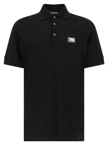 Polo Shirt by Dolce & Gabbana for men in cotton black showcases a sharp silhouette, detailed with a refined and sharp for a sophisticated finish.